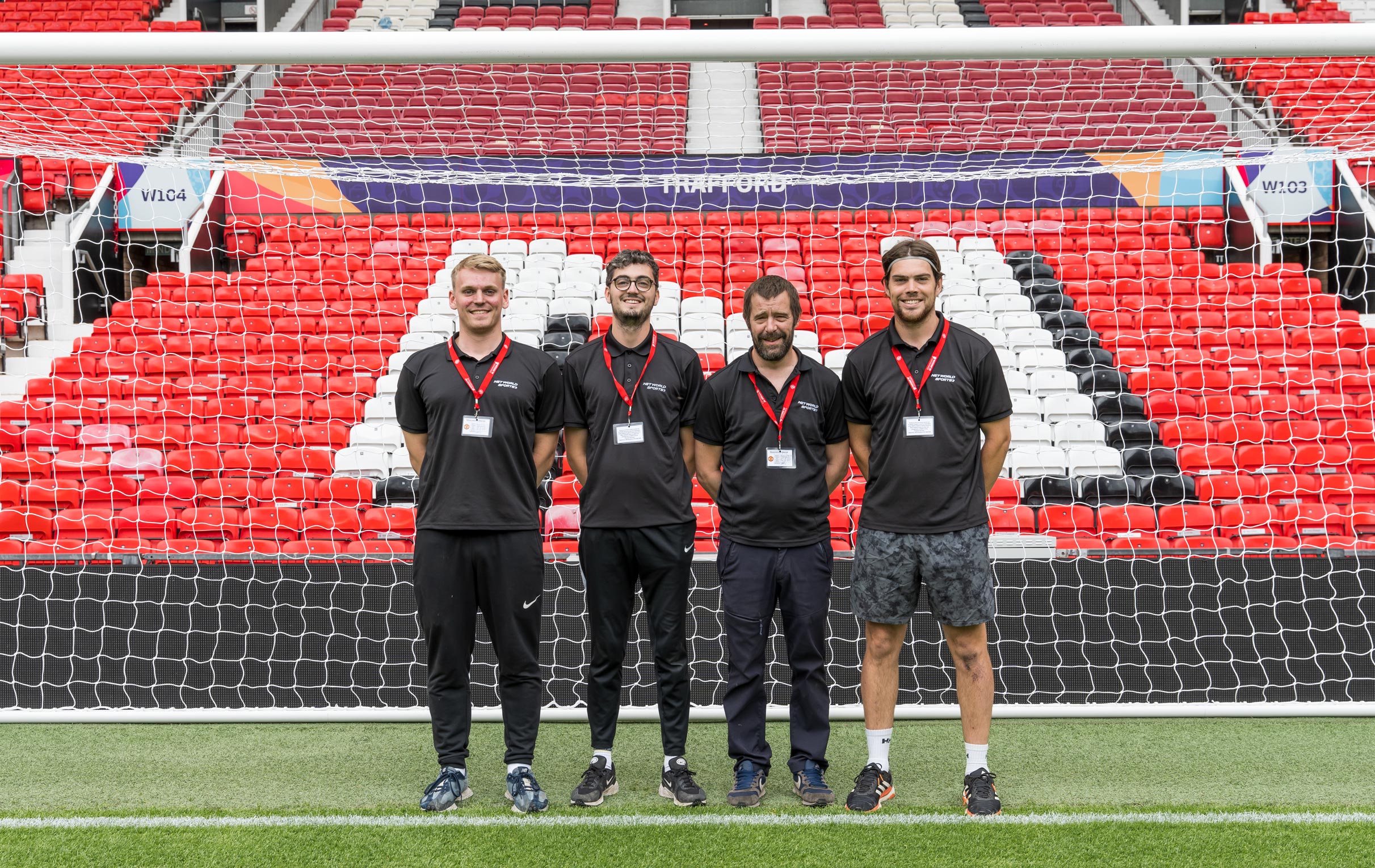 Goal post installation team at Old Trafford